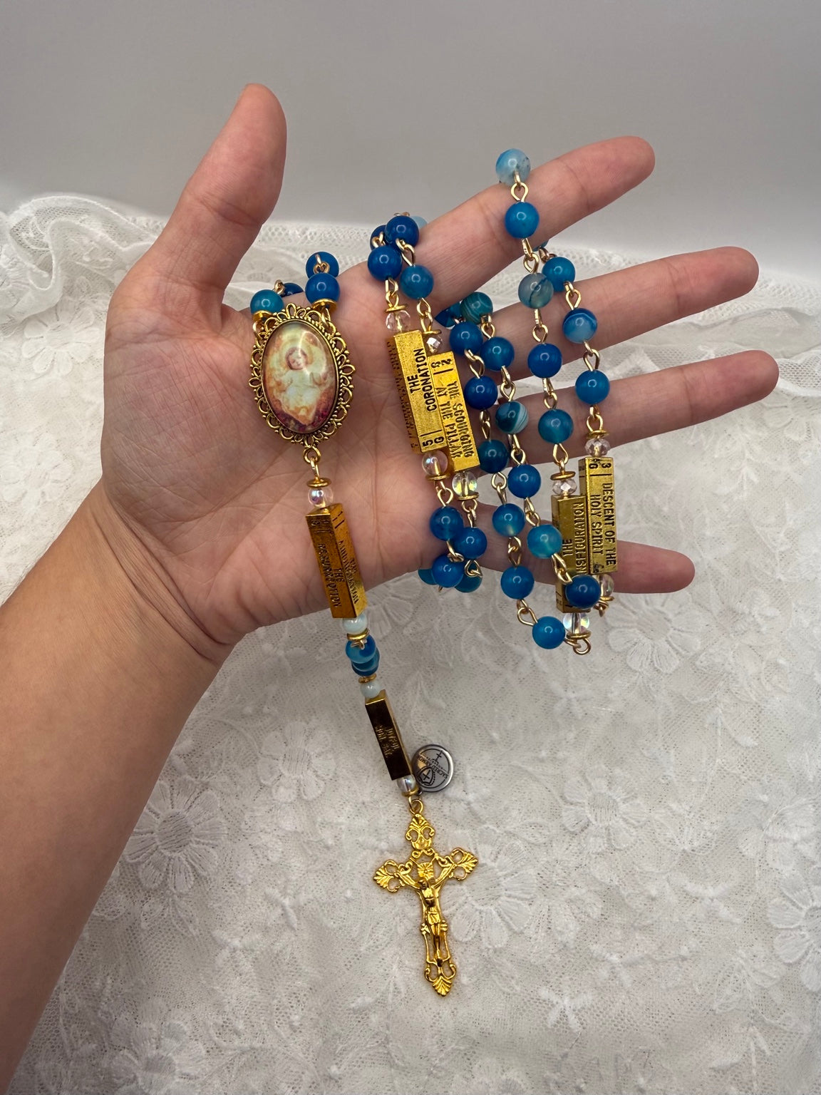 Handheld blue agate guided mystery rosary with gold crucifix