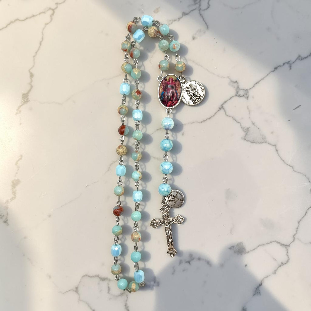 Aqua St. Michael Chaplet vertical view in natural light