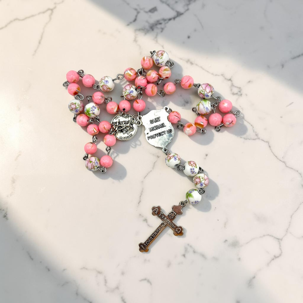 Pink floral St. Michael Chaplet reverse side showing Saint Michael protect us centerpiece