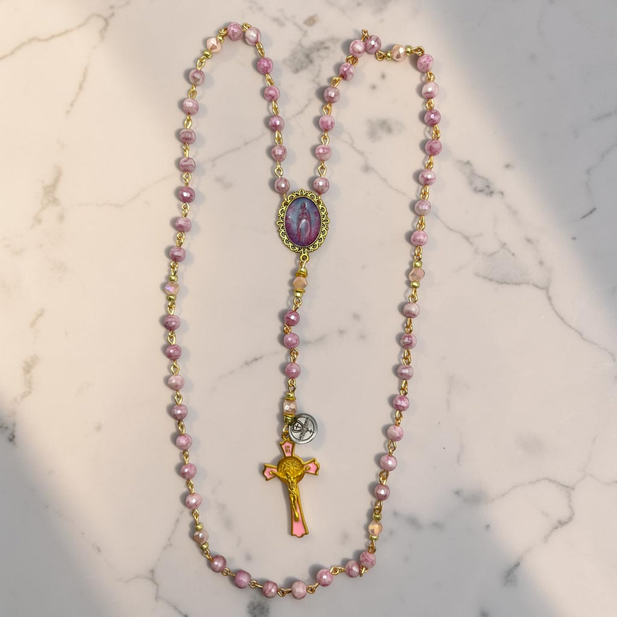 Rosa Mystica Chaplet full view with pink marbled beads and gold-tone links
