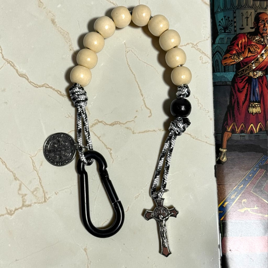 Wooden St. Benedict decade rosary with light wood beads, black carabiner, and silver-tone crucifix
