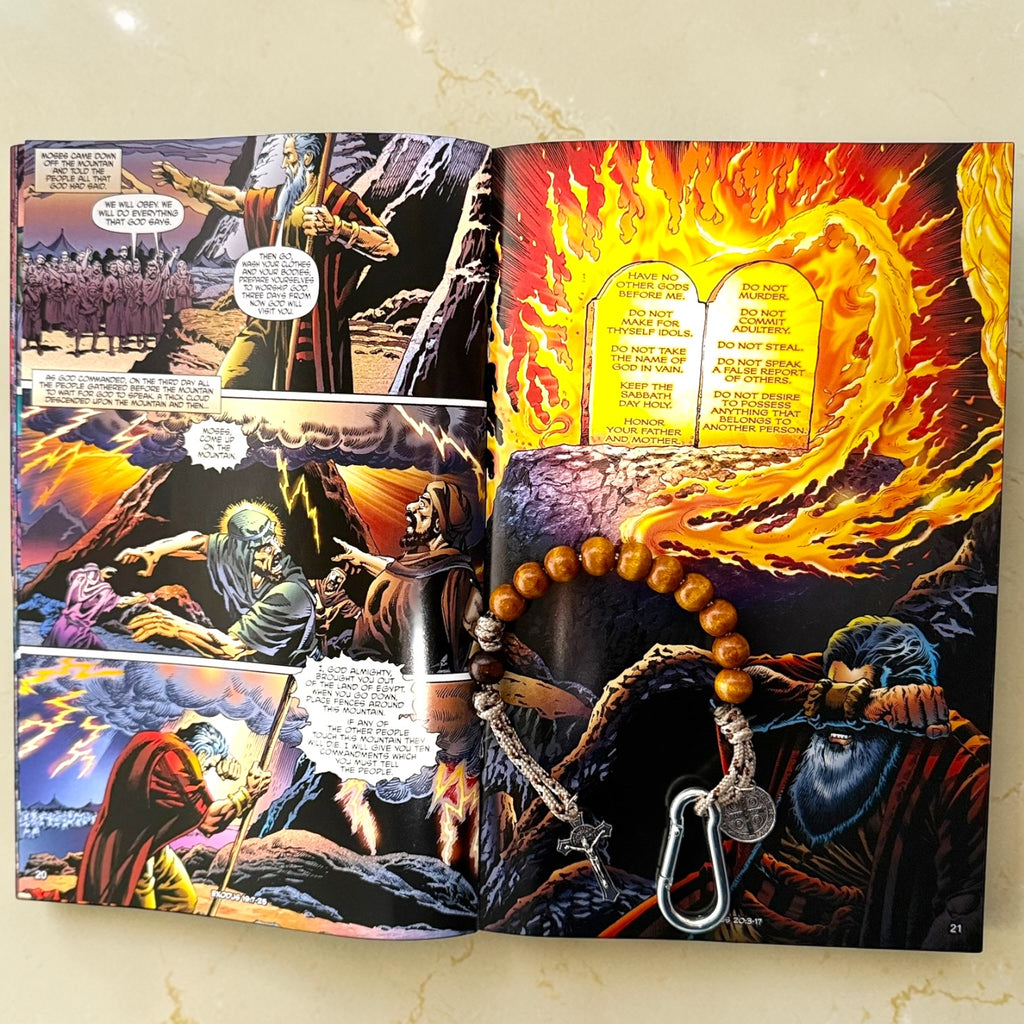 Exodus Christian comic book interior with Ten Commandments artwork and wooden St. Benedict decade rosary