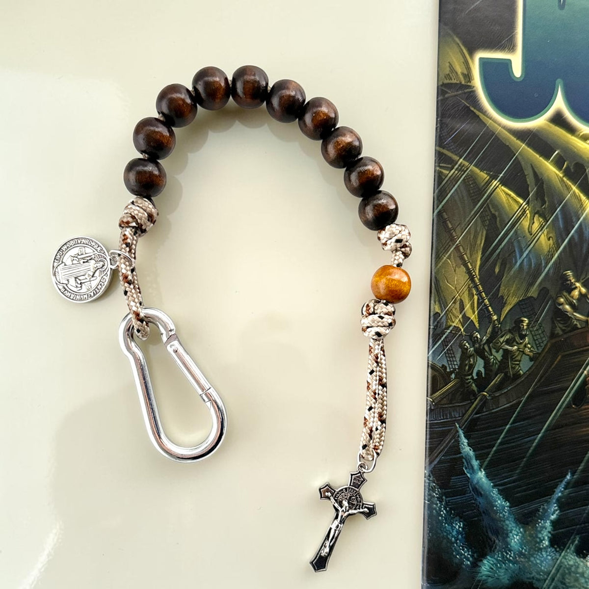 Wooden St. Benedict decade rosary with dark wood beads, silver carabiner, and silver-tone crucifix
