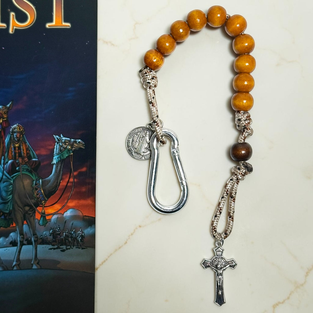 Wooden St. Benedict decade rosary with warm wood beads, silver carabiner, and silver-tone crucifix