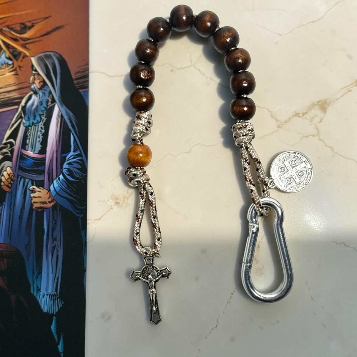 Wooden St. Benedict decade rosary with dark wood beads, silver carabiner, and silver-tone crucifix