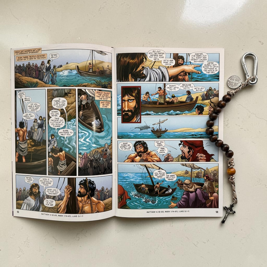 The Christ Volume 4 comic book open to Jesus calling the disciples with wooden St. Benedict decade rosary