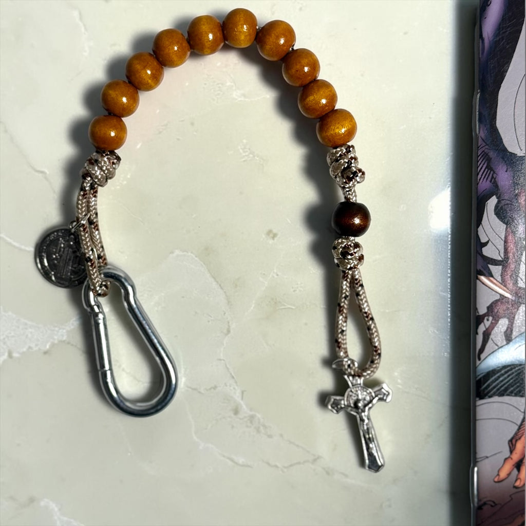 Wooden St. Benedict decade rosary with warm wood beads, silver carabiner, and silver-tone crucifix