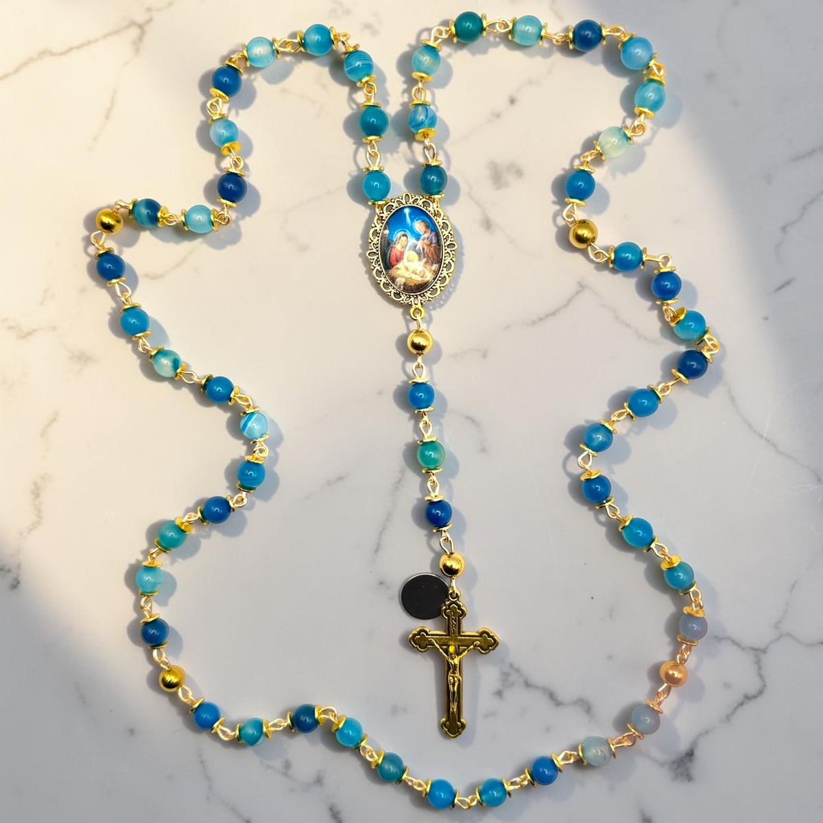 Blue striped agate and gold Holy Night rosary full view