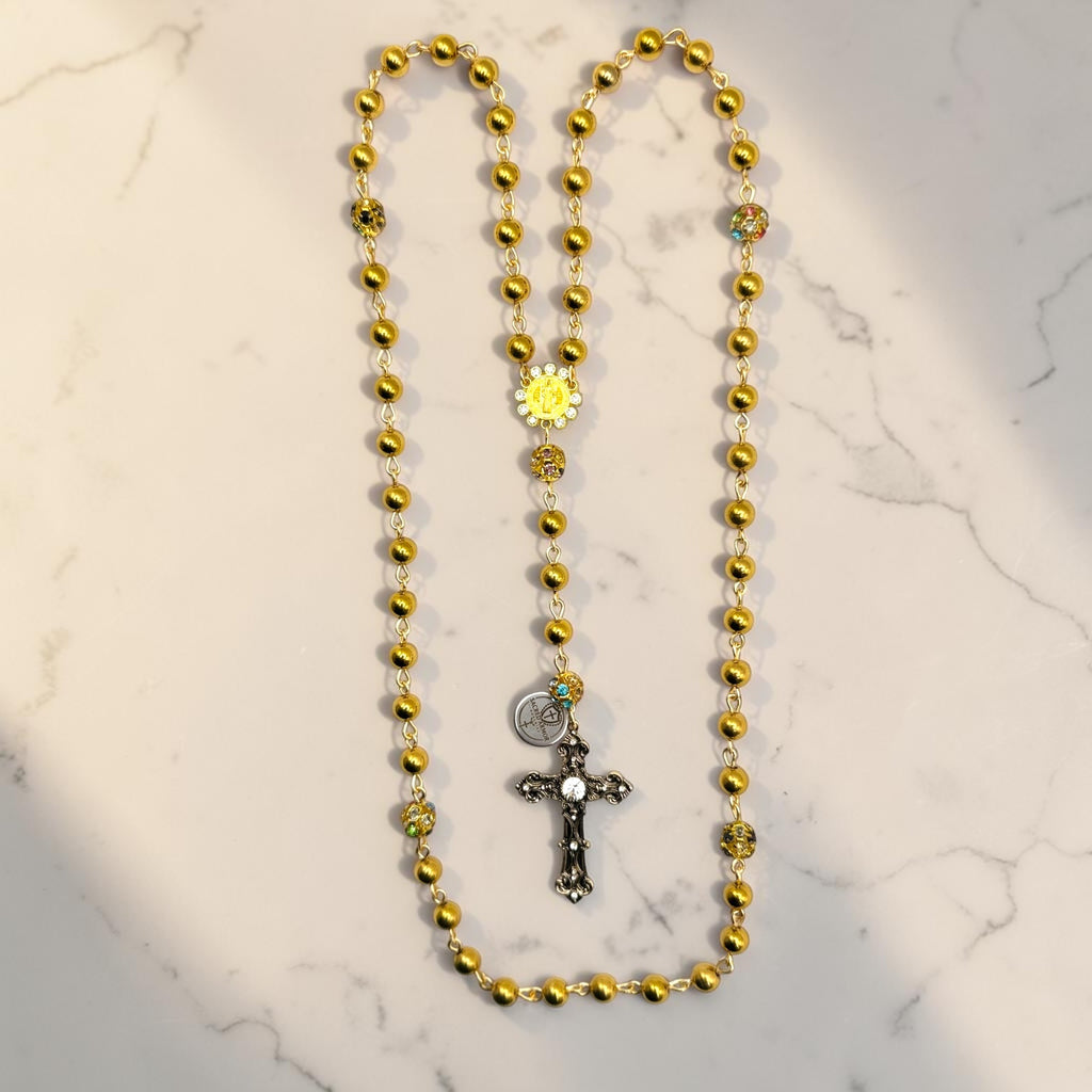 Gold Saint Benedict rosary with crystal gemstone accent beads full view