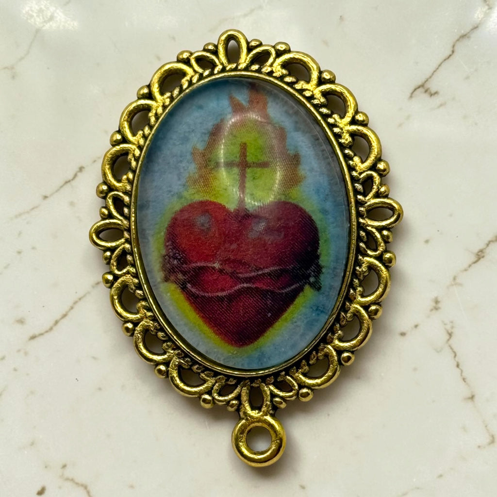 Gold Sacred Heart of Jesus glass cabochon rosary centerpiece front close-up