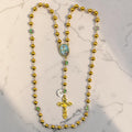 Gold Saint Joseph rosary with floral glass accent beads full view
