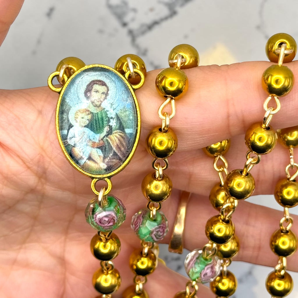 Saint Joseph and Child Jesus rosary centerpiece close-up