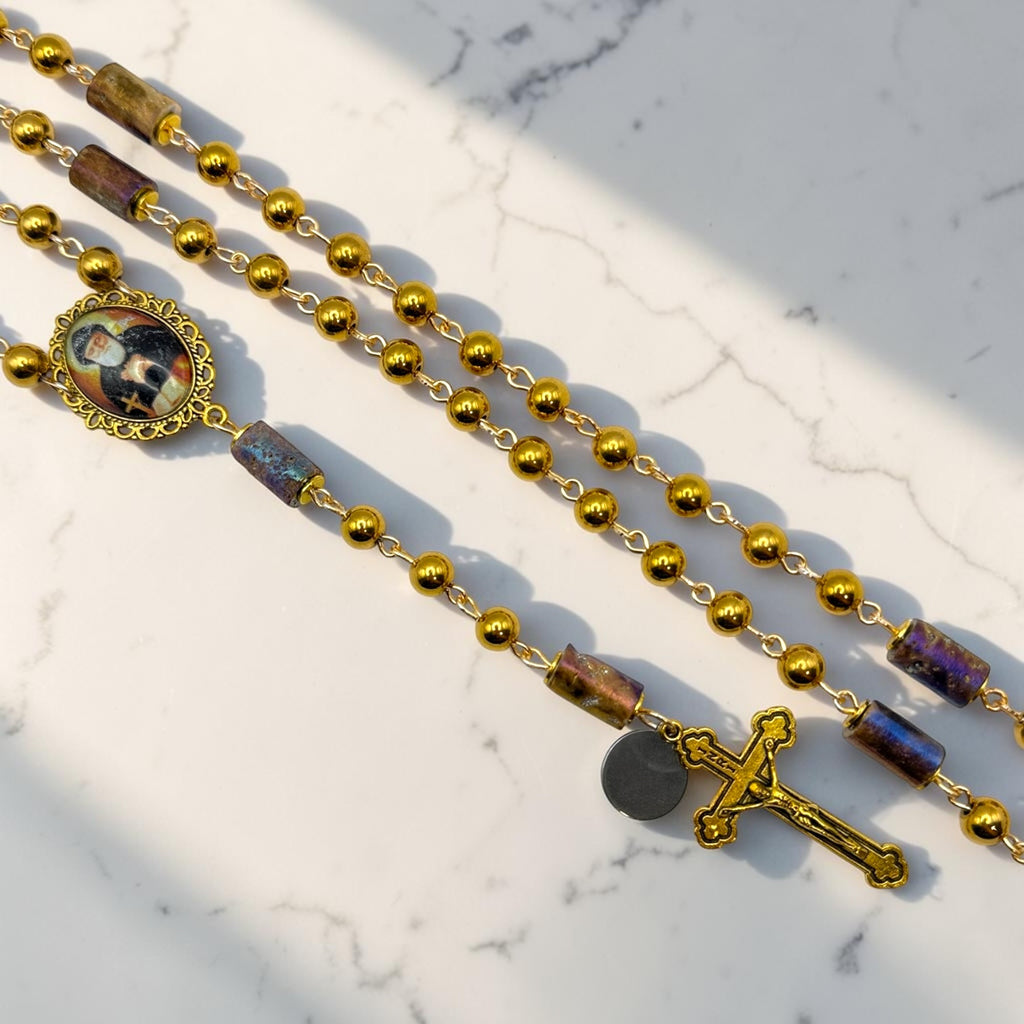 Gold St. Charbel Rosary close-up with iridescent accent beads