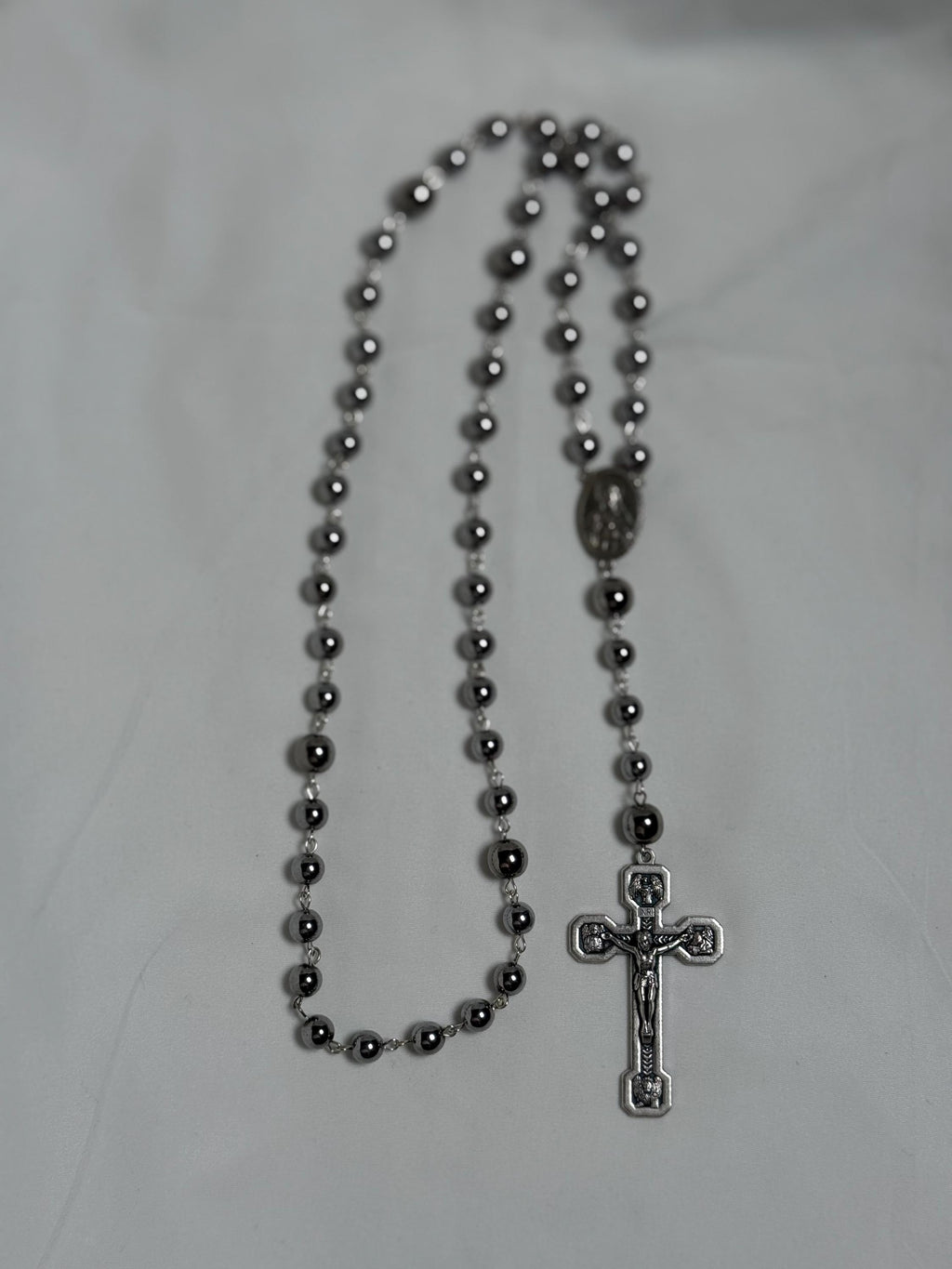 Stations of the Cross crucifix detail on black hematite rosary