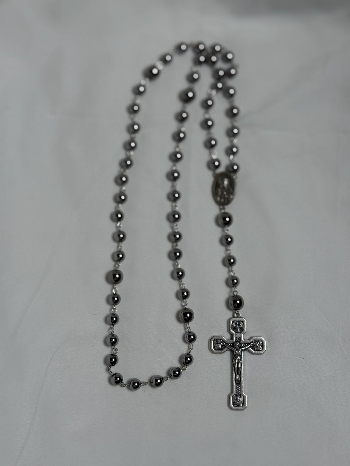 Stations of the Cross crucifix detail on black hematite rosary