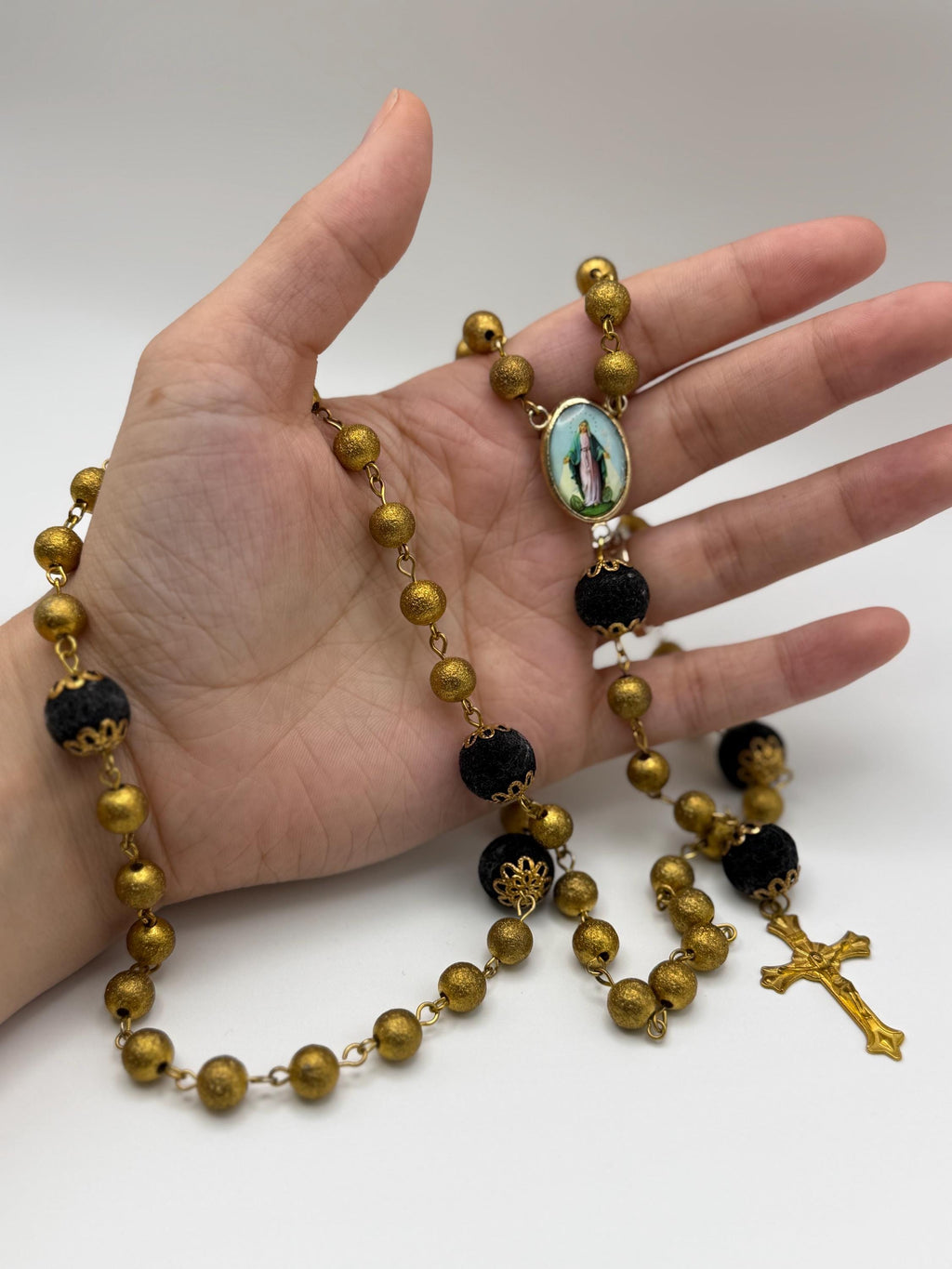 Gold and Black Miraculous Medal Rosary detail view