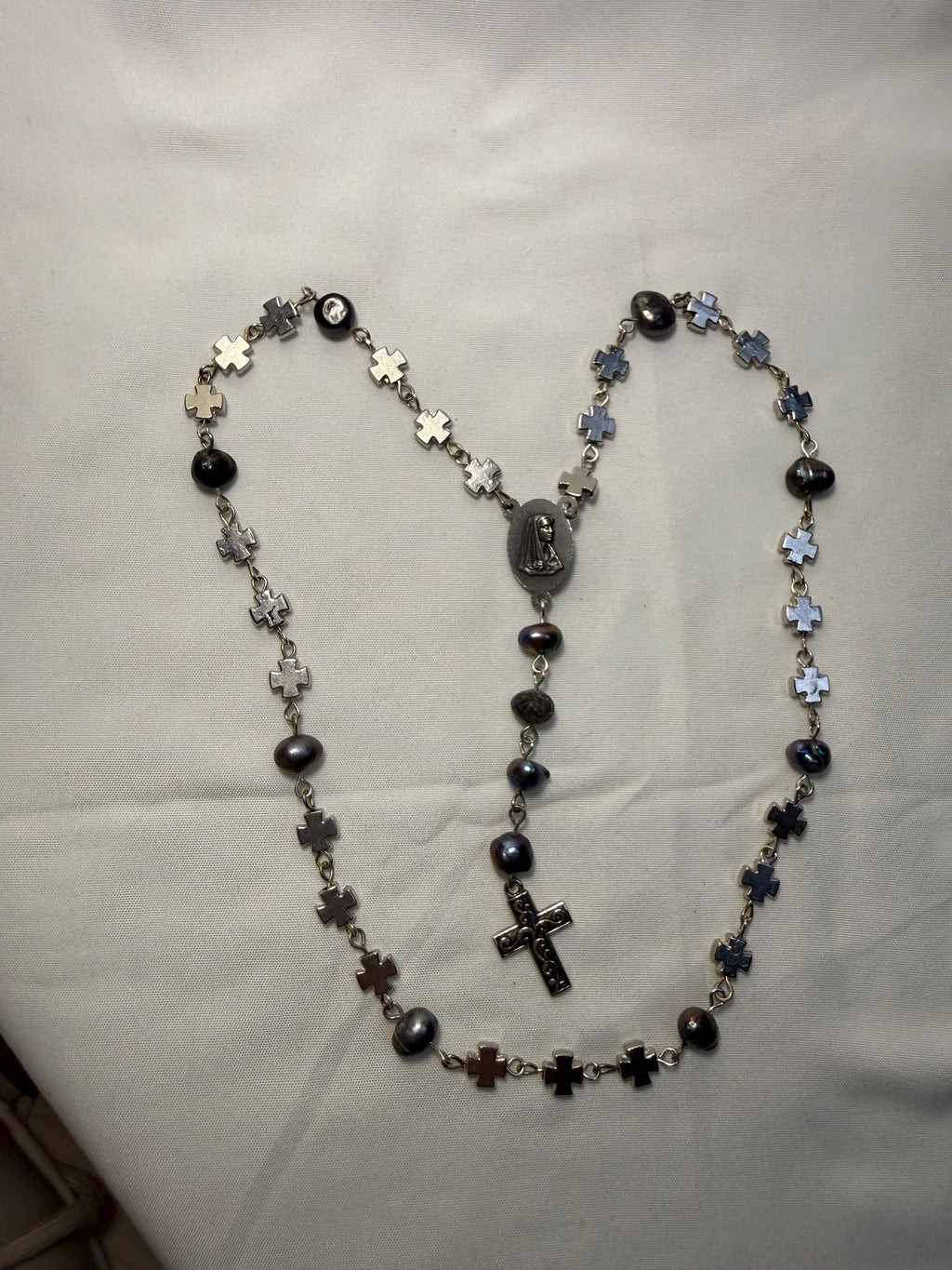 St. Michael Chaplet silver cross bead detail