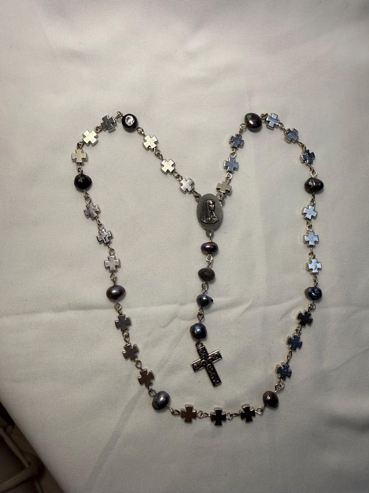 St. Michael Chaplet silver cross bead detail
