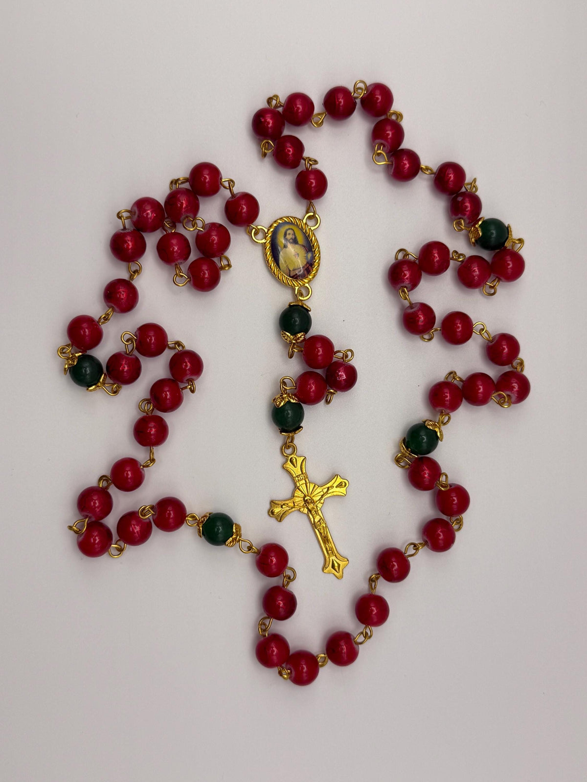 Red and Green Sacred Heart Rosary with gold-tone details