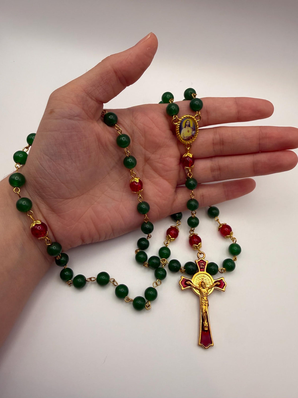 Green and Red Sacred Heart Rosary with gold-tone details