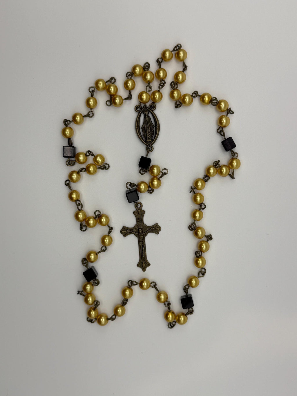 Gold Pearl Miraculous Medal Rosary with black accents