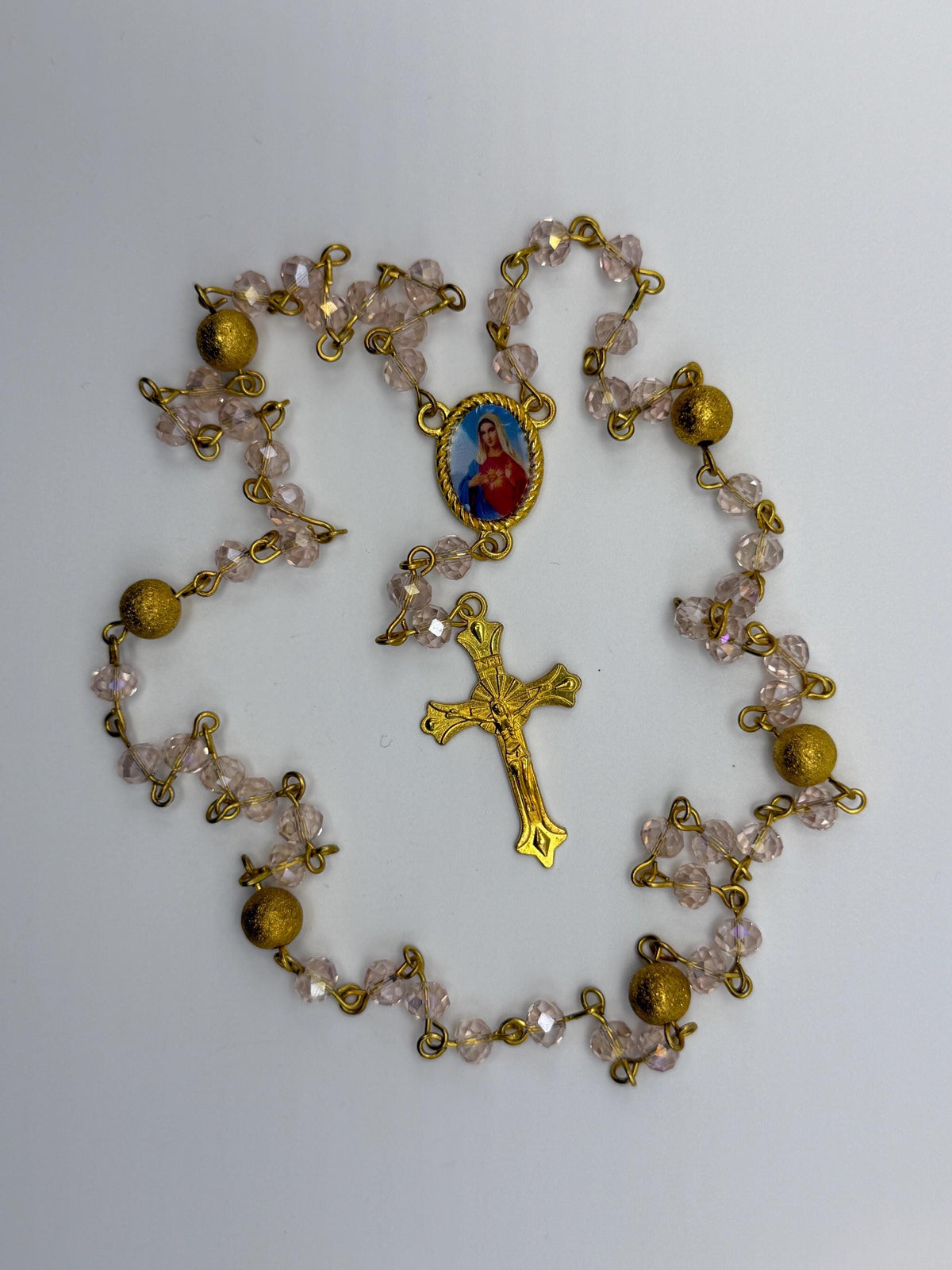 Pink Crystal Immaculate Heart Rosary with gold-tone details