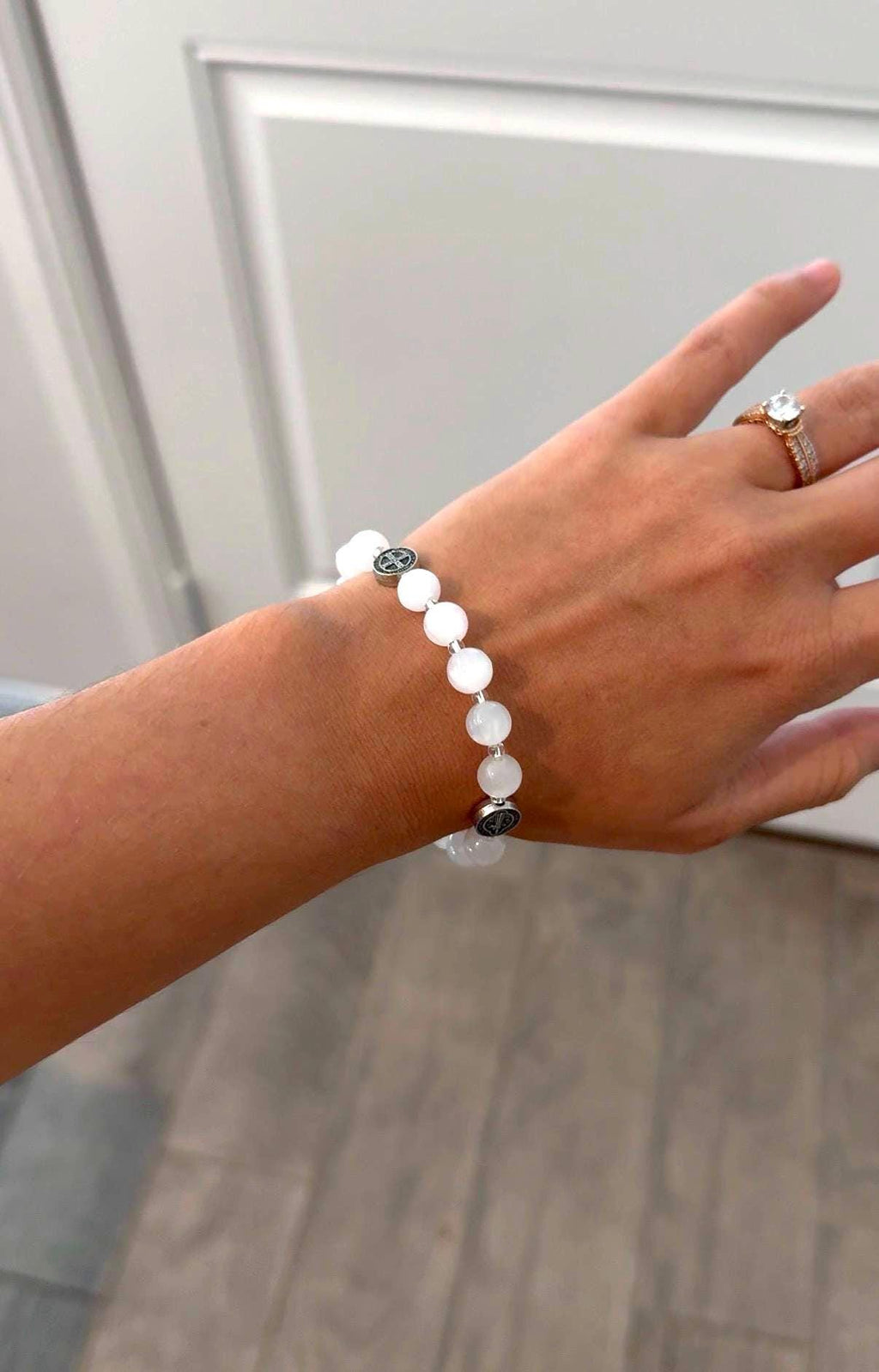 St. Benedict color-changing bracelet indoor view
