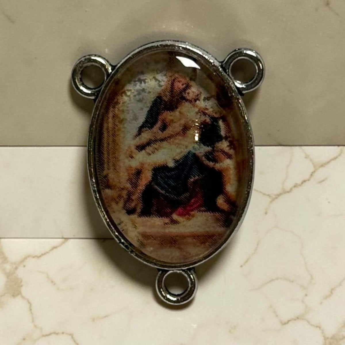 Pieta glass cabochon rosary centerpiece