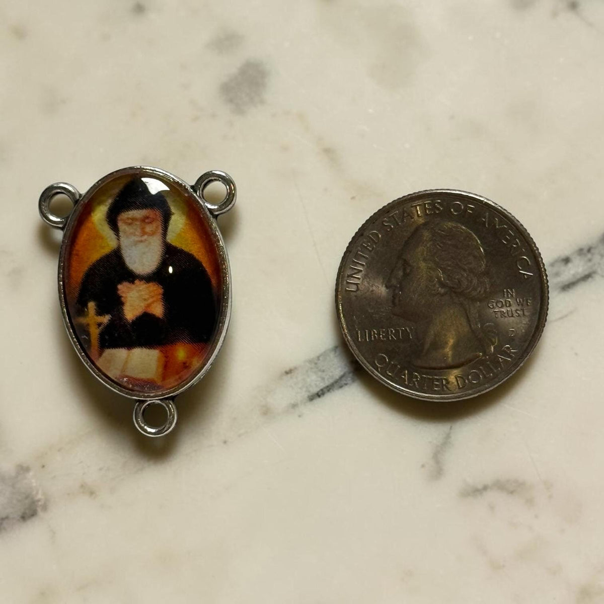 Saint Charbel rosary centerpiece detail view