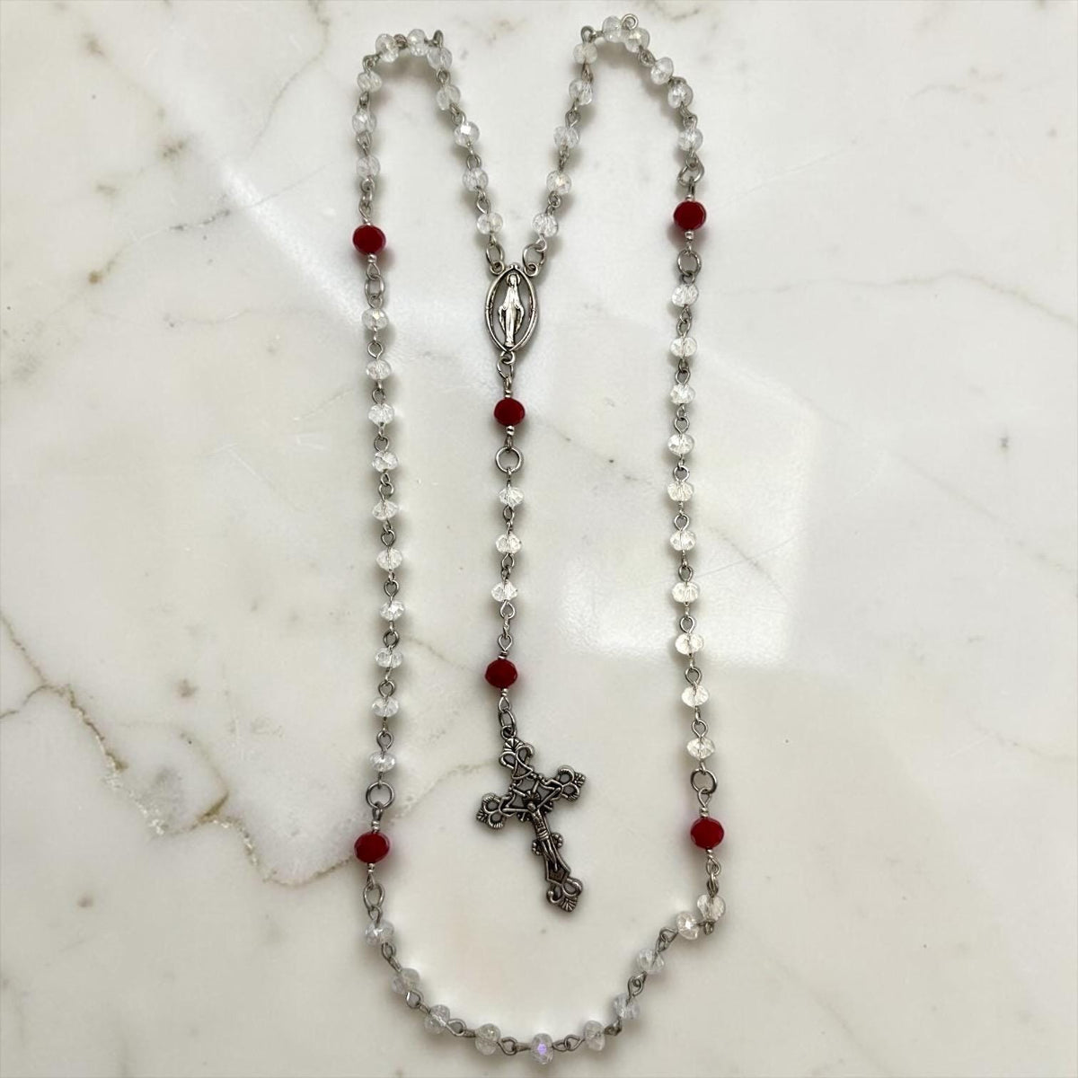 Clear and Red Crystal Miraculous Medal Rosary detail view