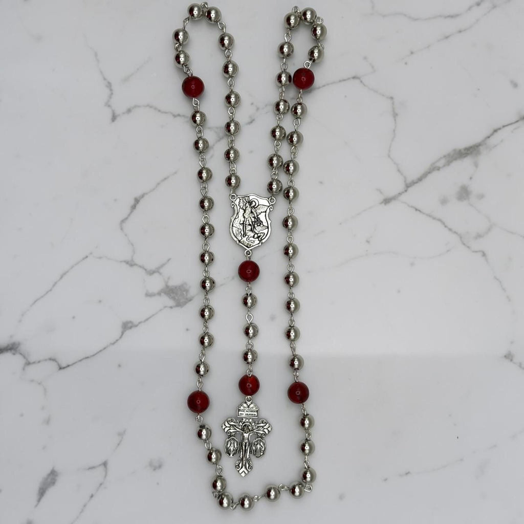 Saint Michael silver and red rosary detail view