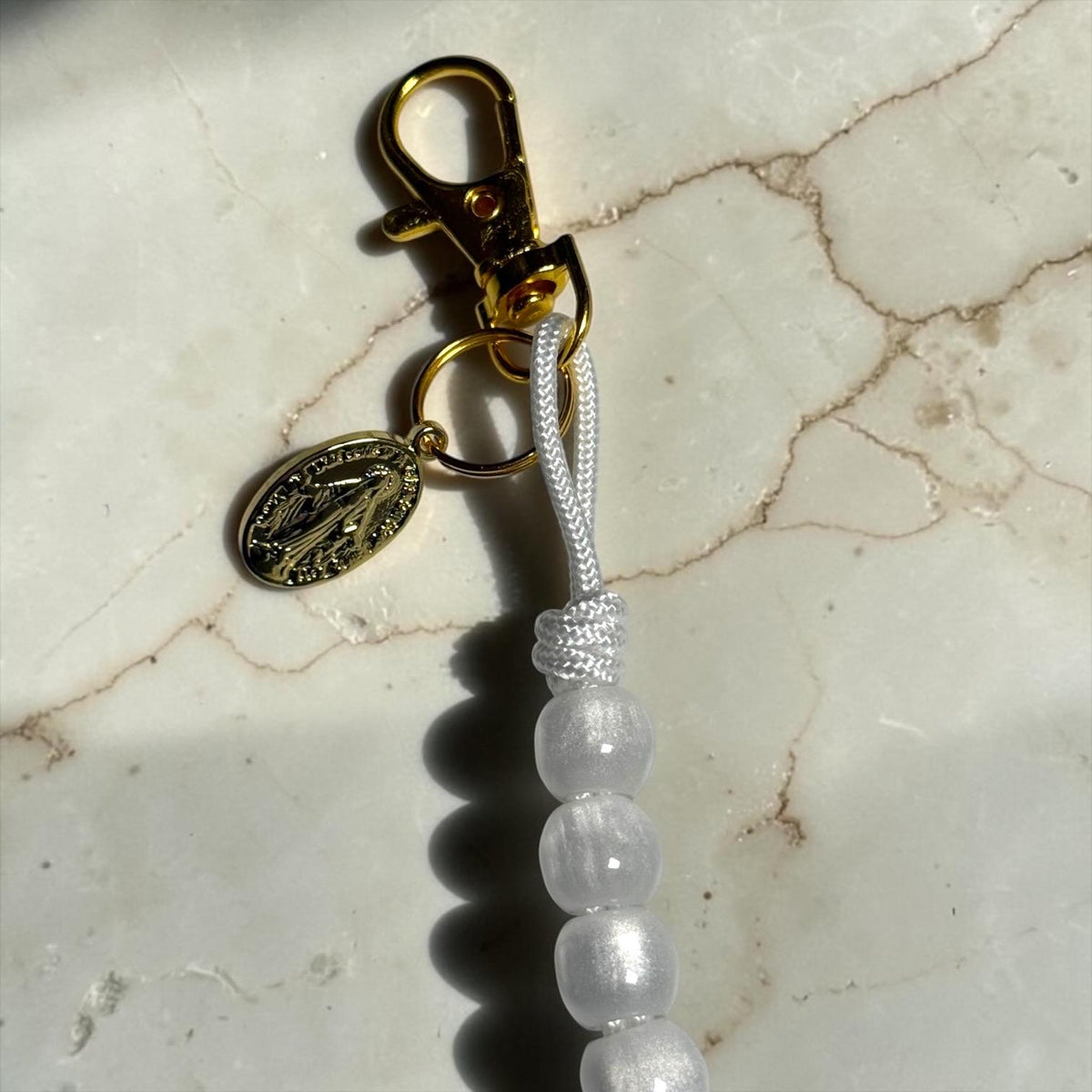 White decade rosary bracelet clasp detail