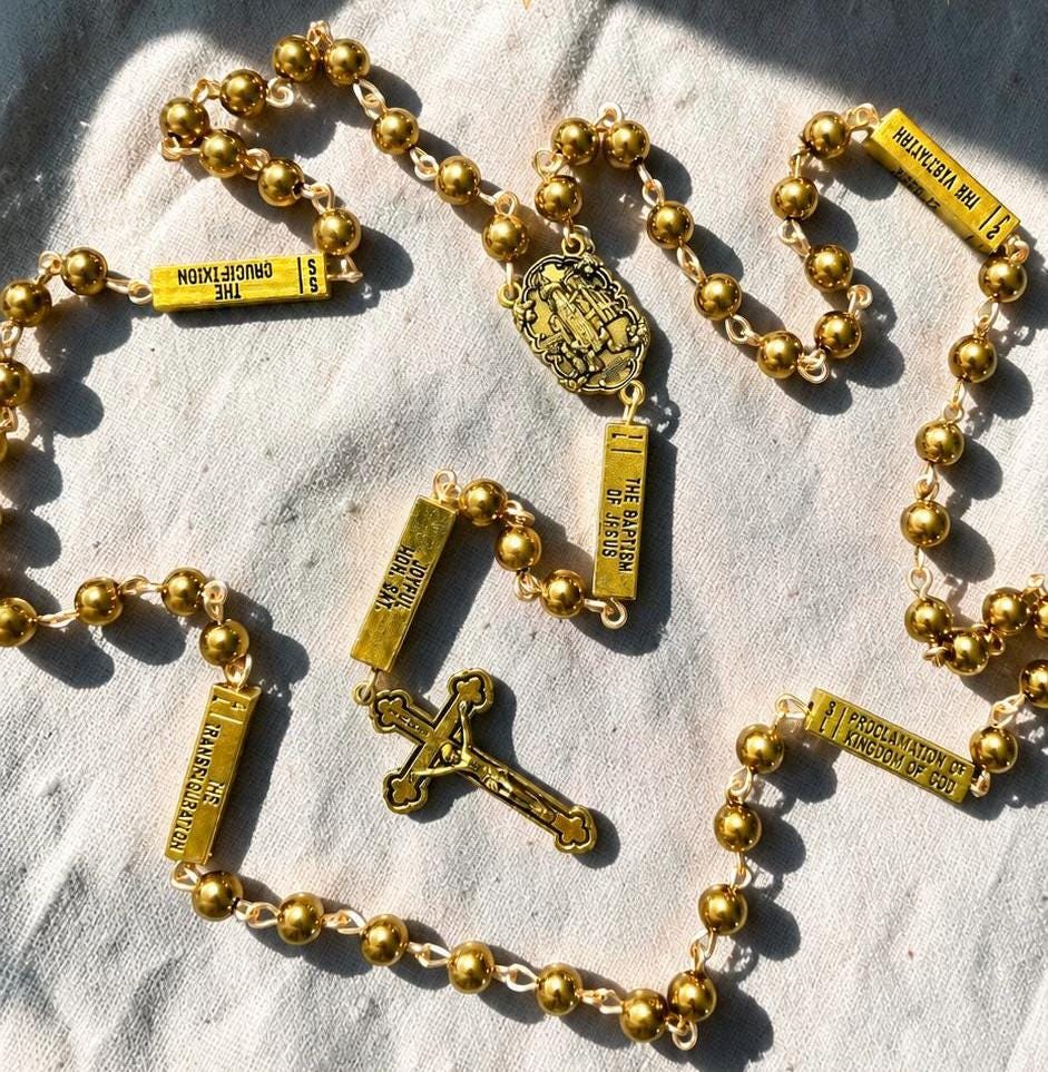 Gold Guided Joyful Mystery Rosary with engraved prayer beads