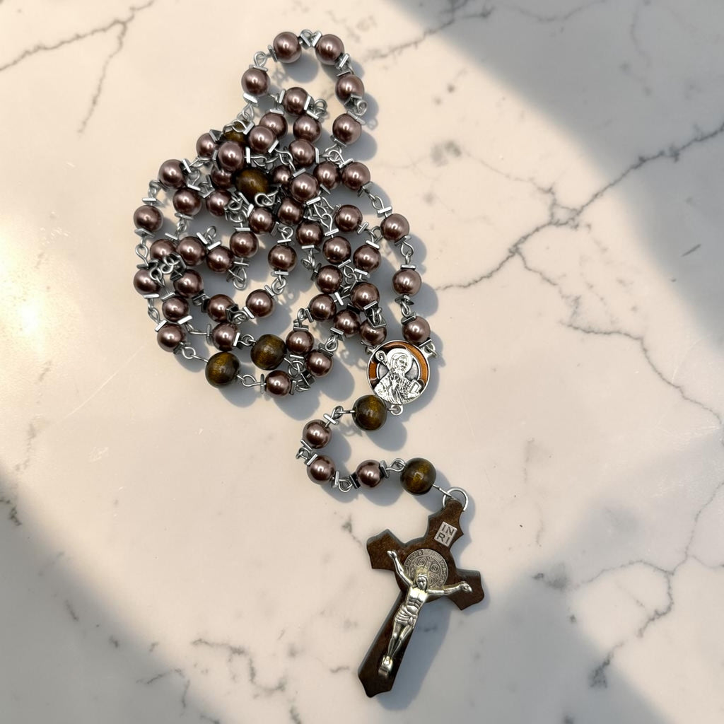Purple pearl and wood Saint Benedict rosary arranged view