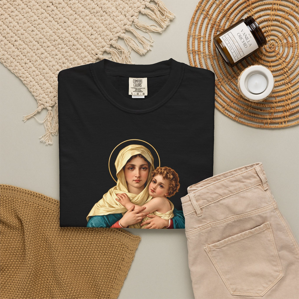 Sacred Armor Rosaries black Comfort Colors t-shirt featuring a vibrant print of Our Lady of Schoenstatt and Jesus.