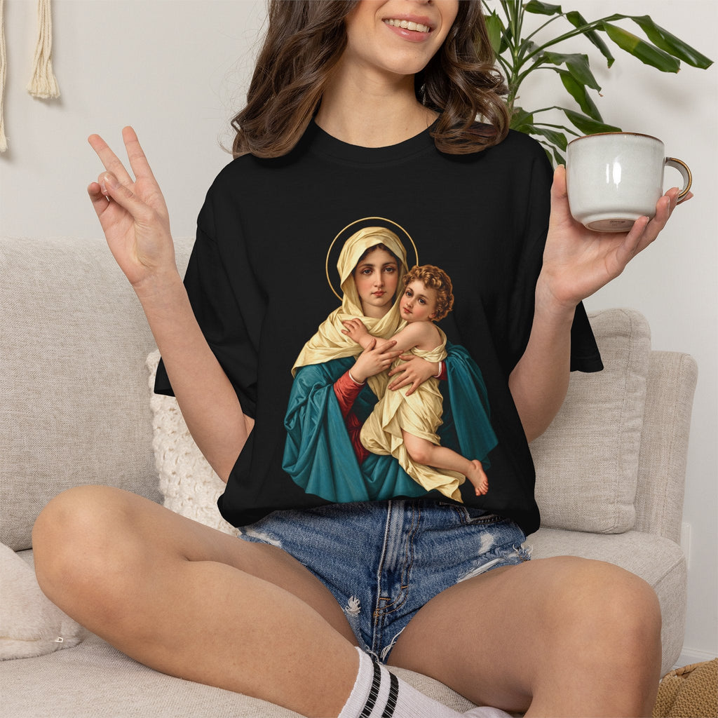 Sacred Armor Rosaries black Comfort Colors t-shirt featuring a vibrant Our Lady of Schoenstatt print on a woman