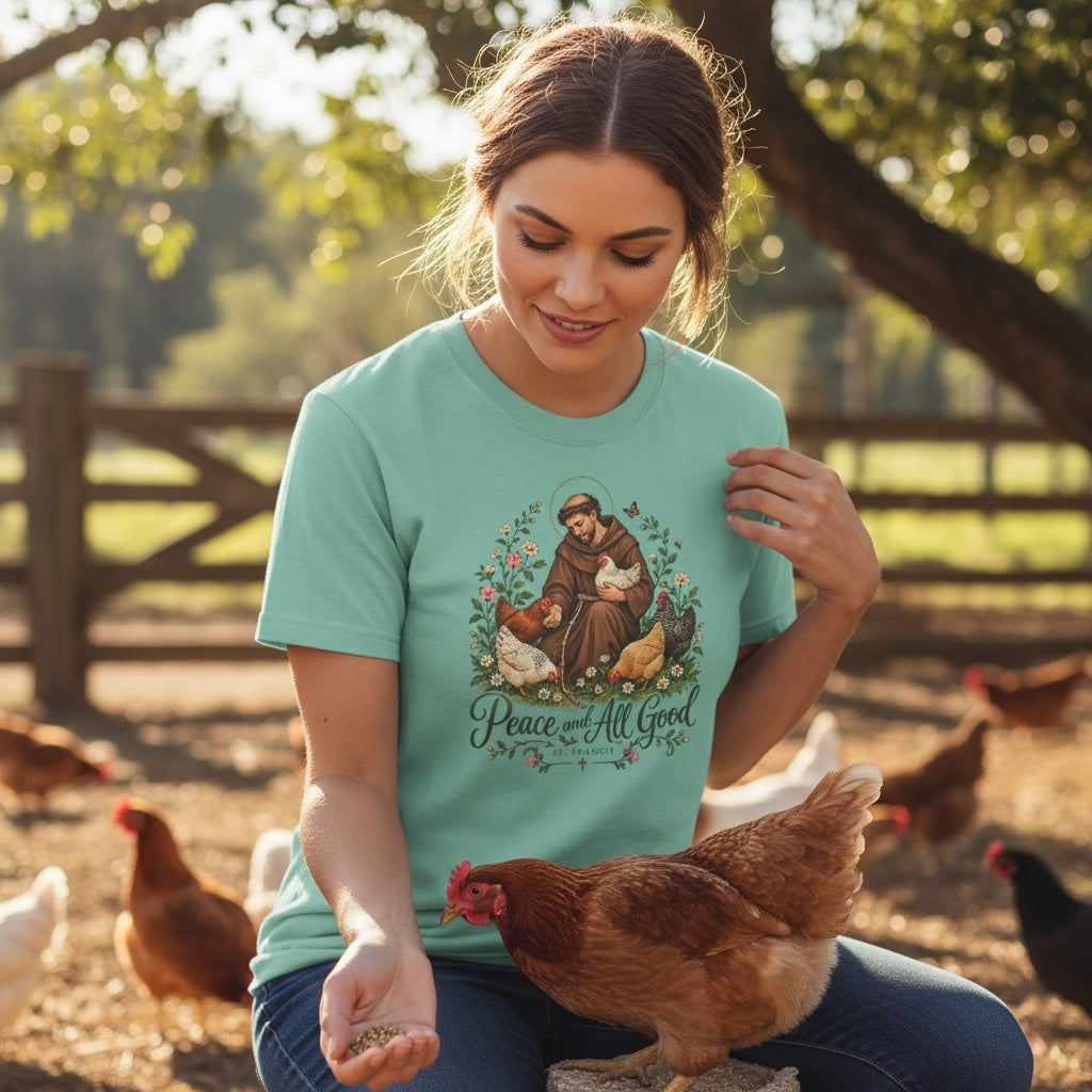 Woman wearing mint St. Francis of Assisi Peace and All Good T-shirt with a chicken